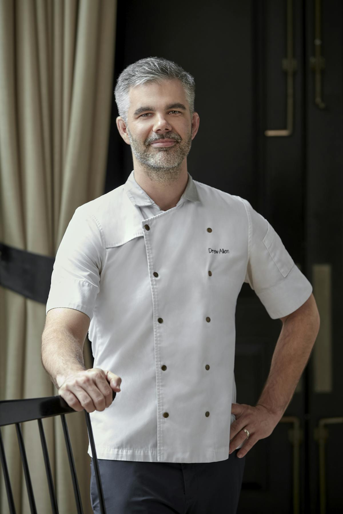 a person standing posing for the camera