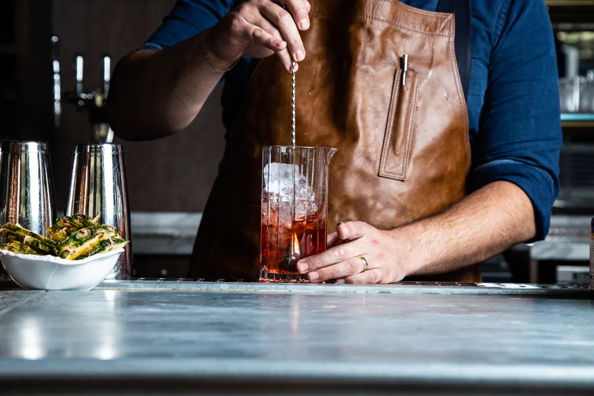 craft cocktails, bartender, stirring drinks, cocktail bar 