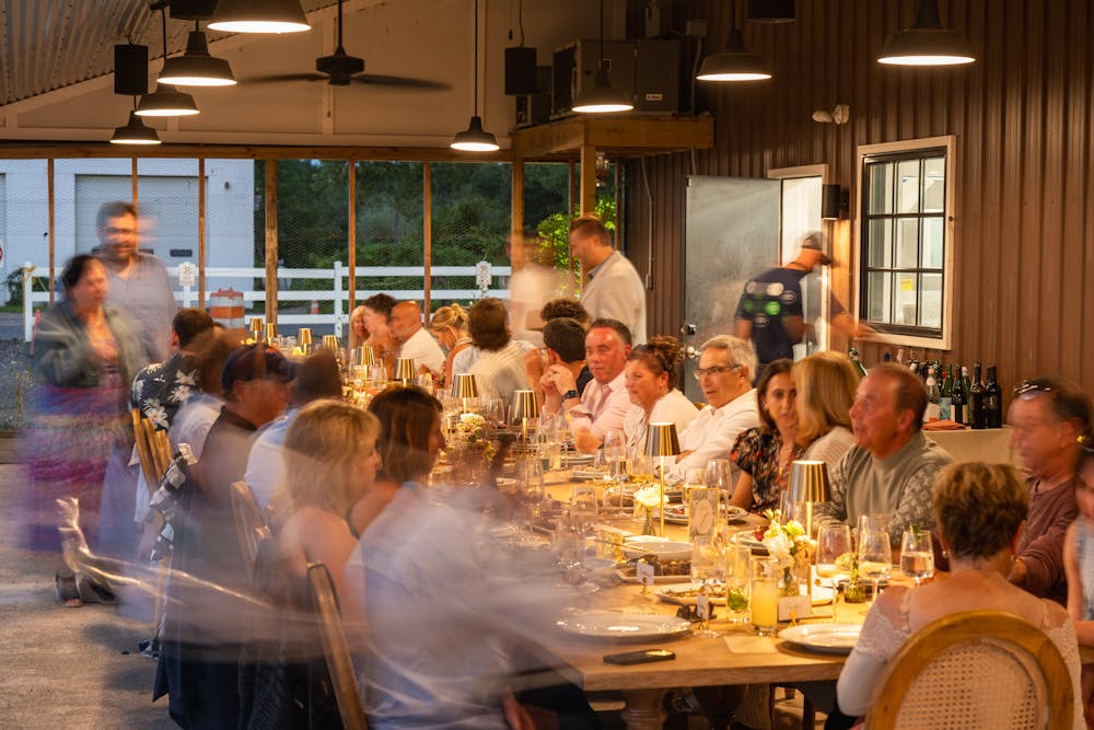 a group of people sitting at a table