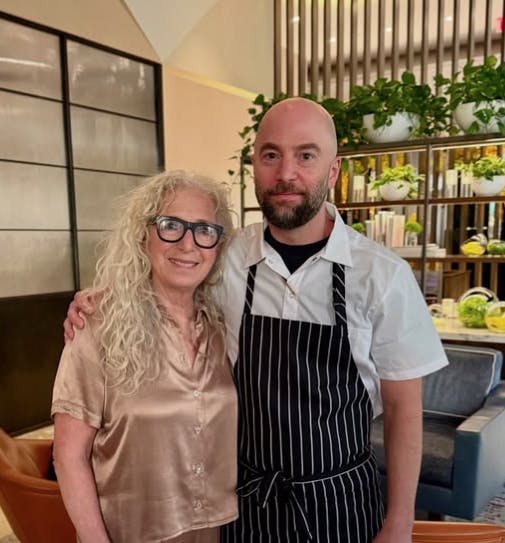 a man and woman standing together