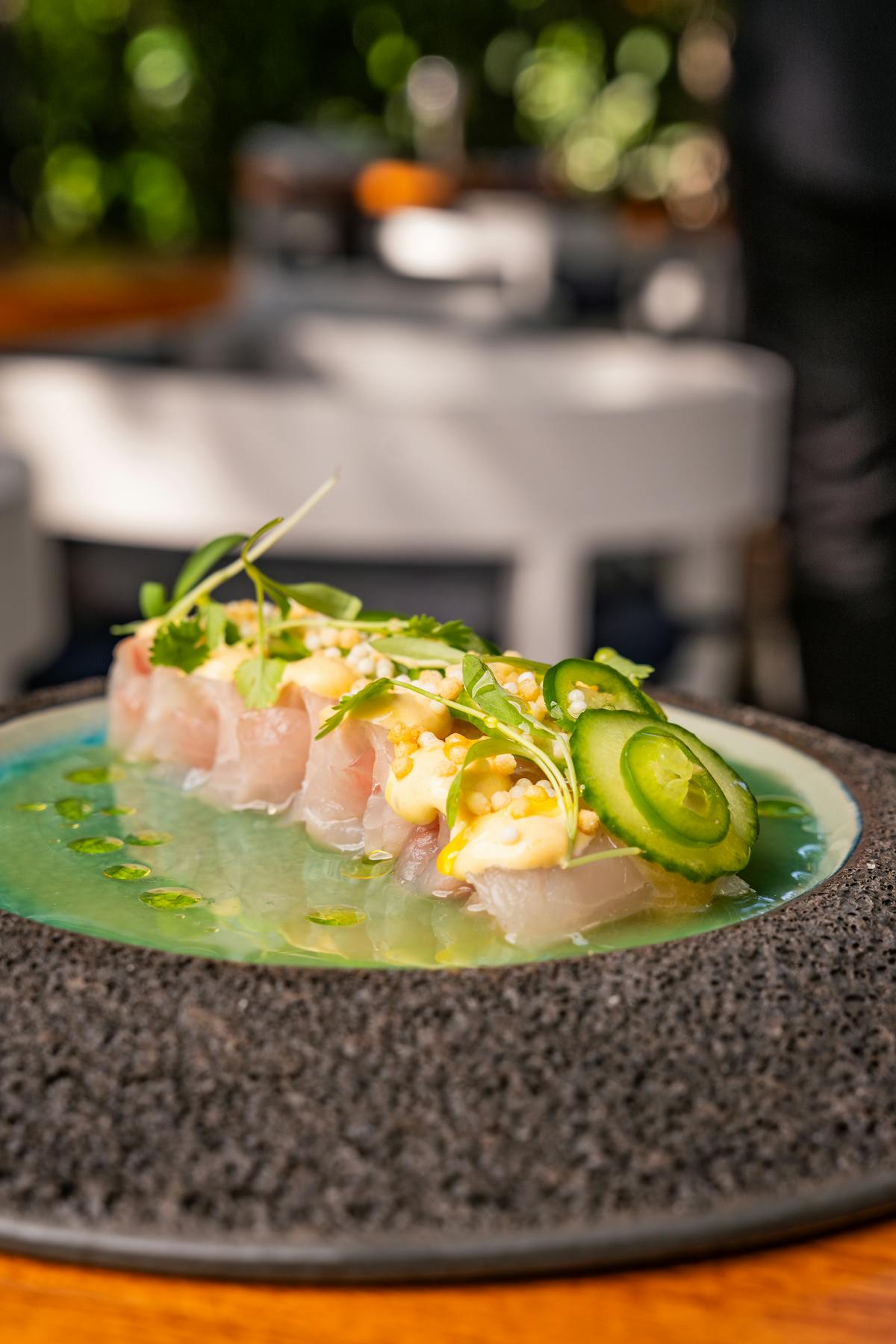 a plate of food with a slice of cake on a table