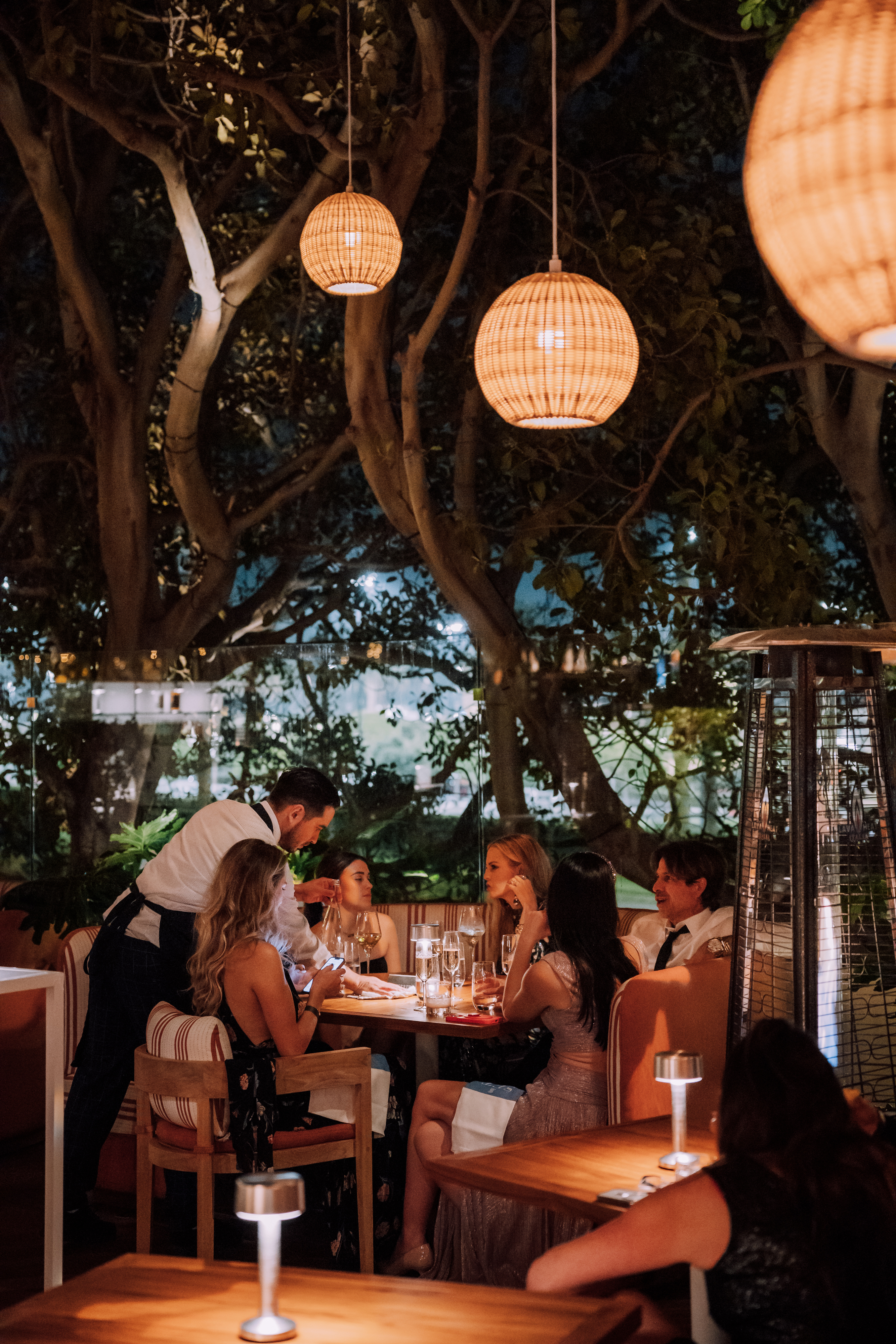 a group of people sitting at a table