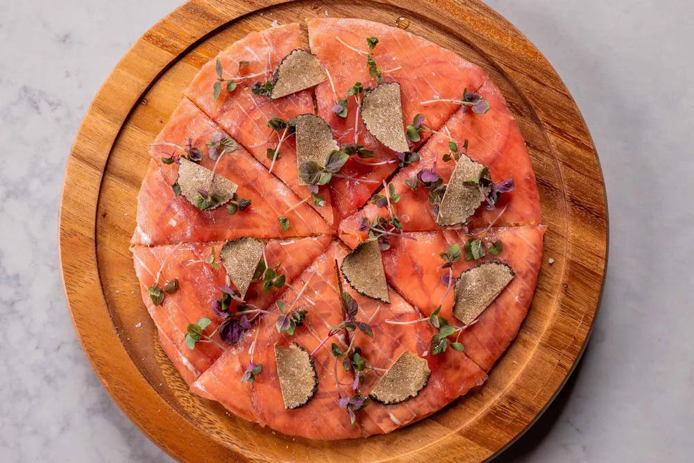 a slice of pizza on a plate