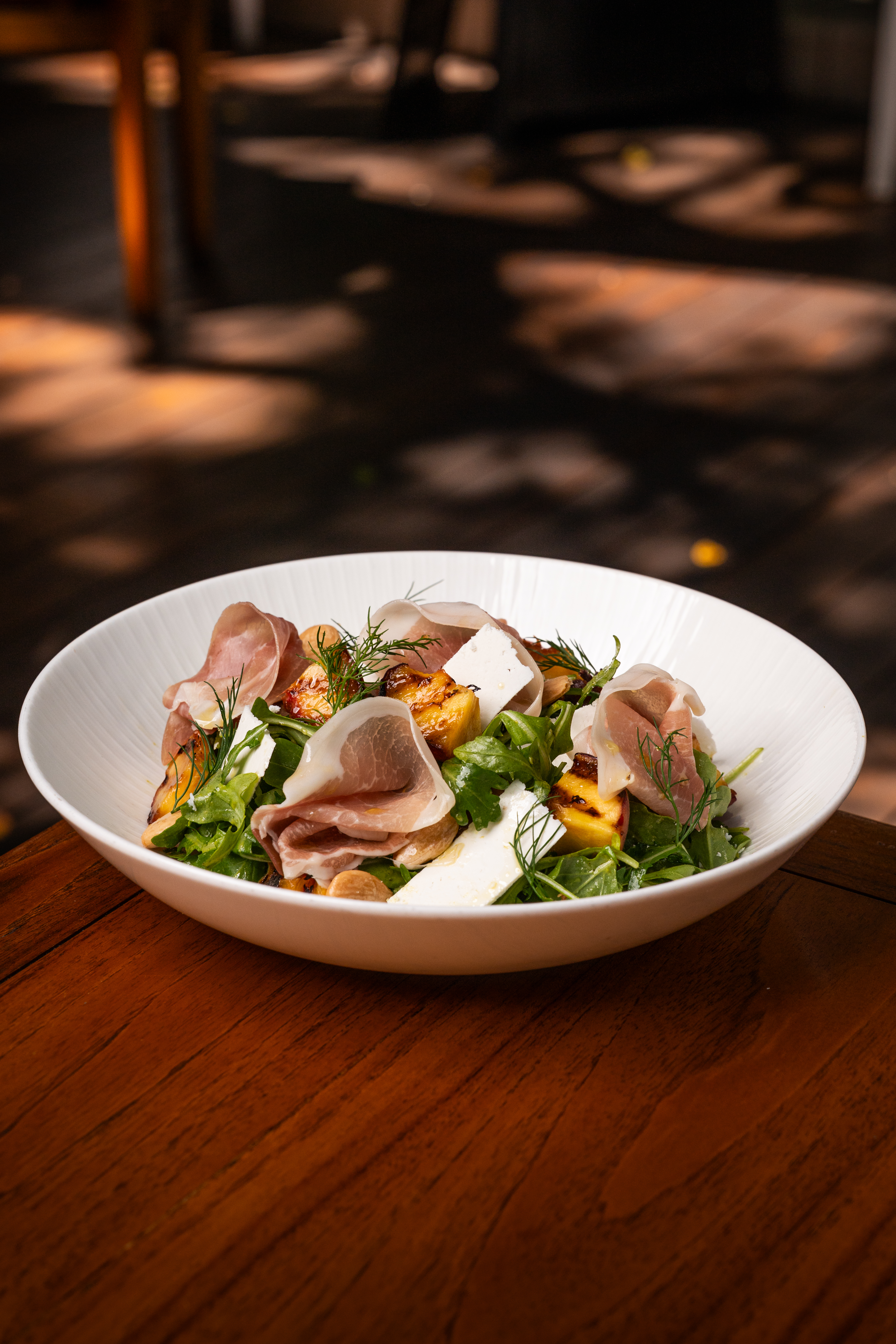 a bowl of food sitting on a table