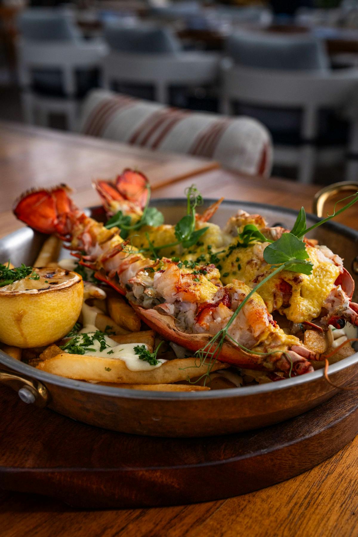 a plate of food sitting on top of a wooden table