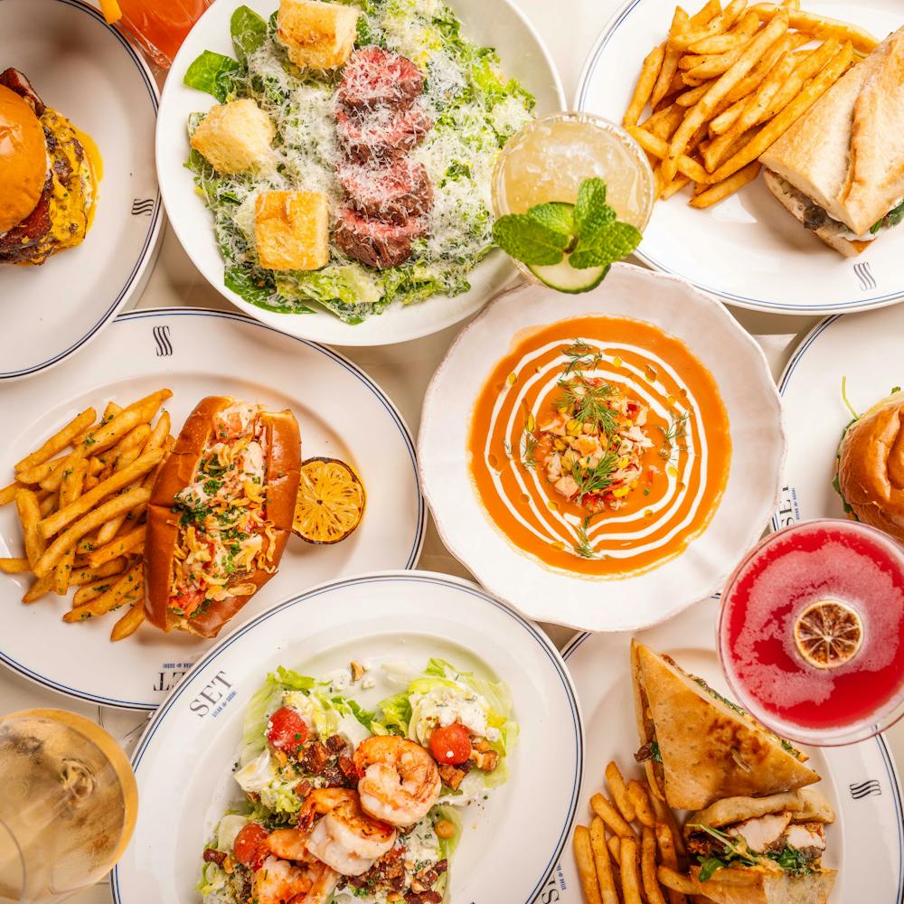 a table topped with different types of food on a plate