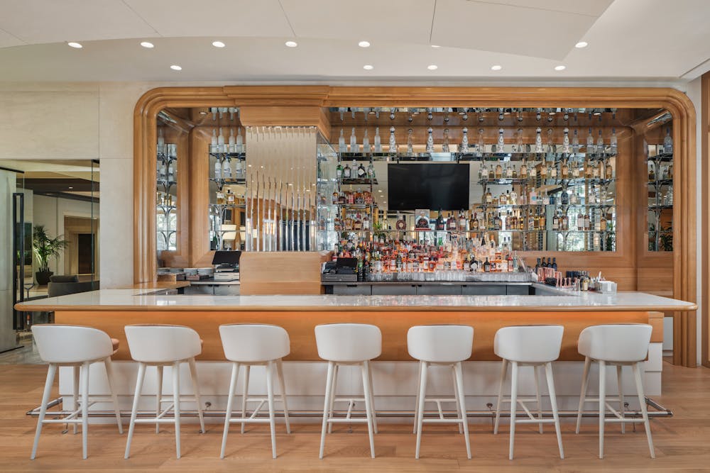 a dining room table in front of a window