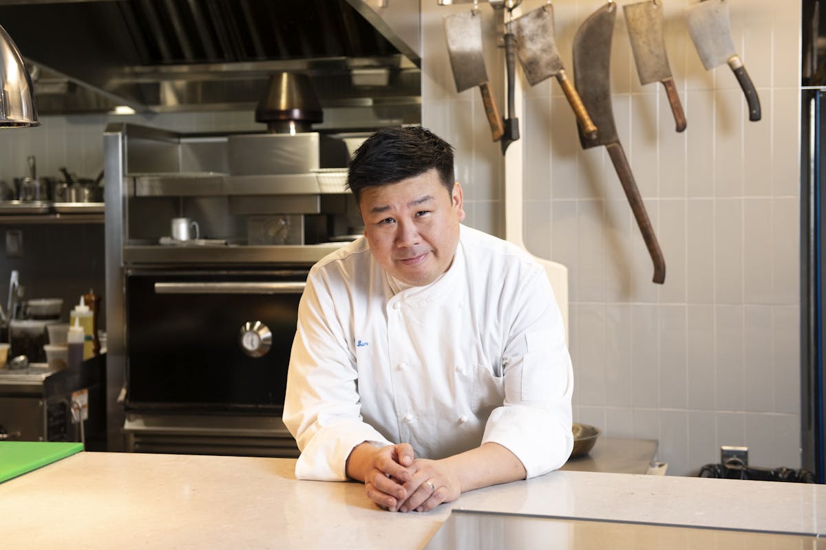 a man preparing food in a kitchen