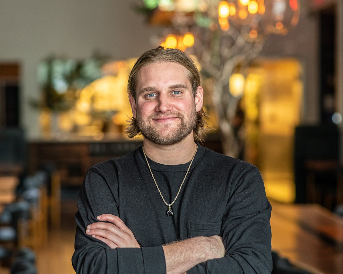 a man standing in front of a store