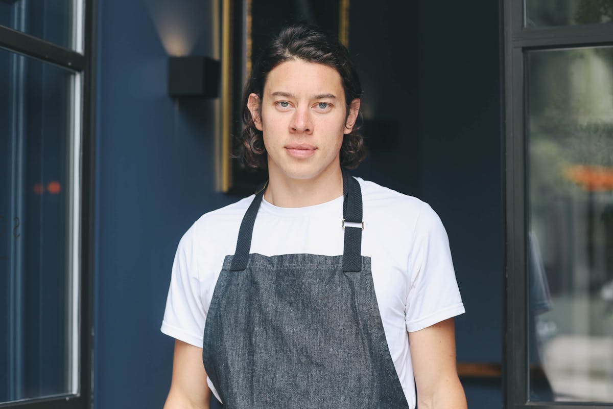 a person standing in front of a window