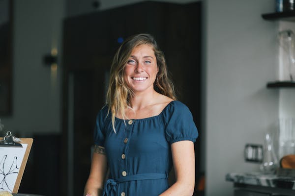 a woman in a blue shirt
