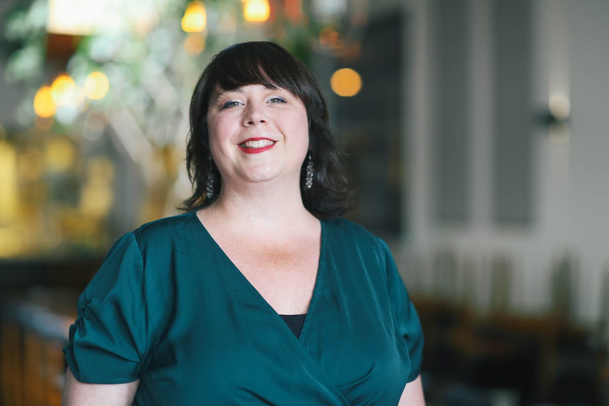 a woman in a blue shirt