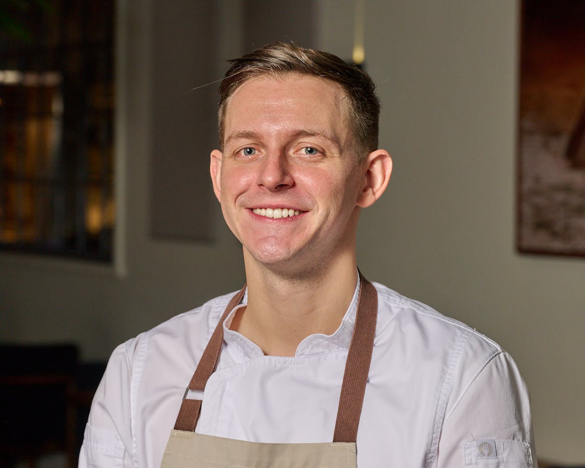 a man smiling for the camera