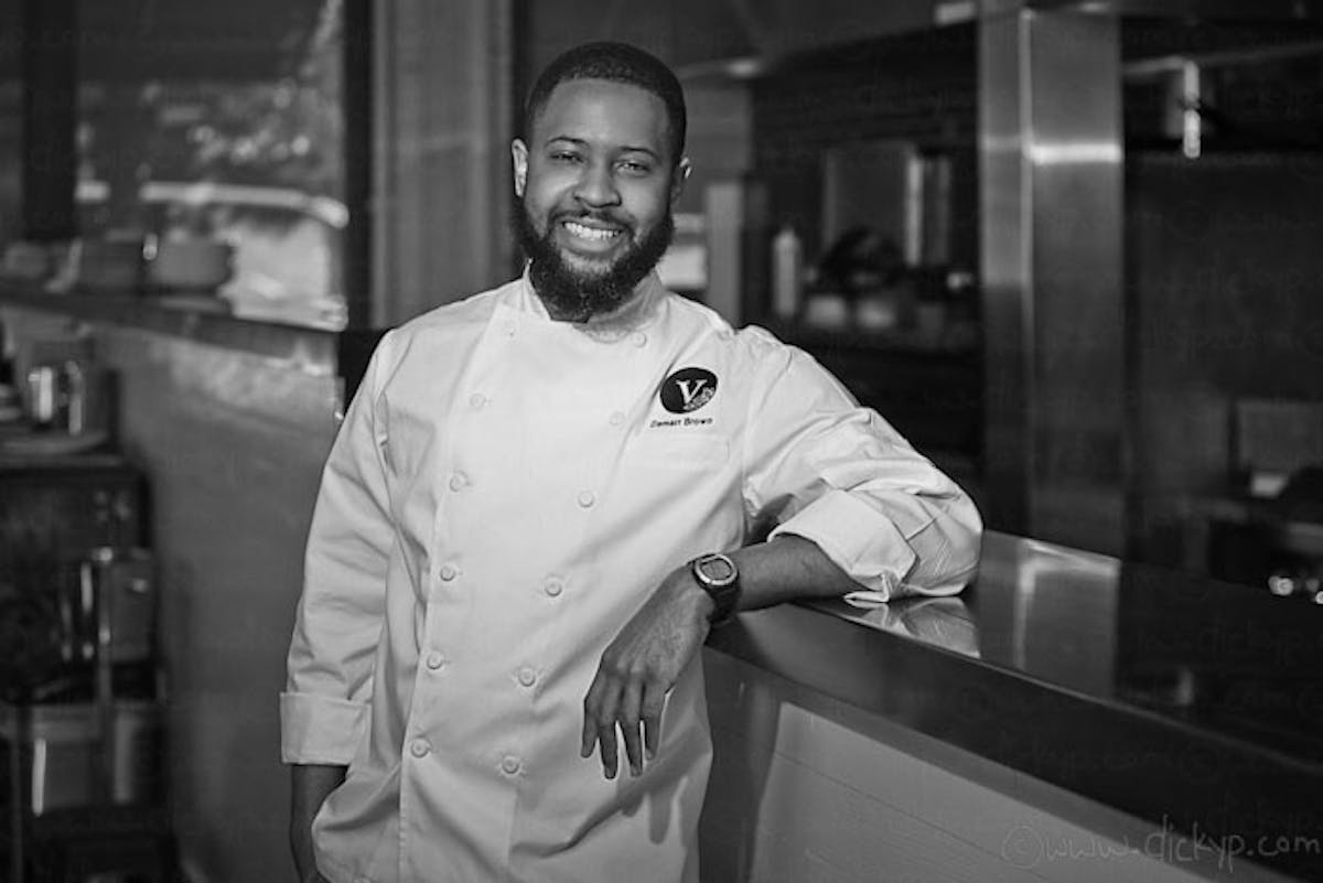 a man standing in a kitchen