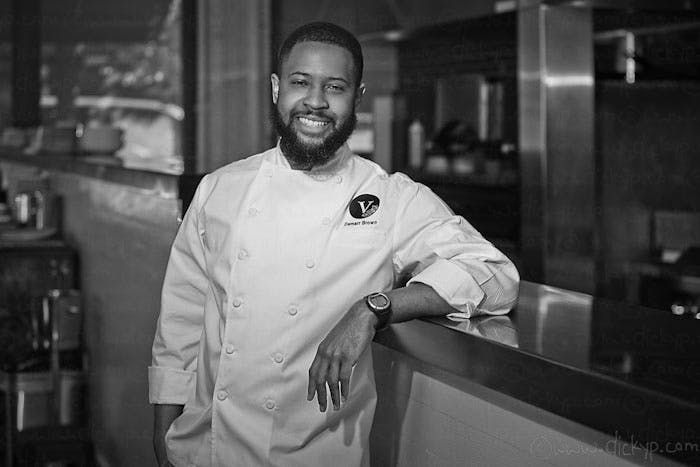 a man standing in a kitchen