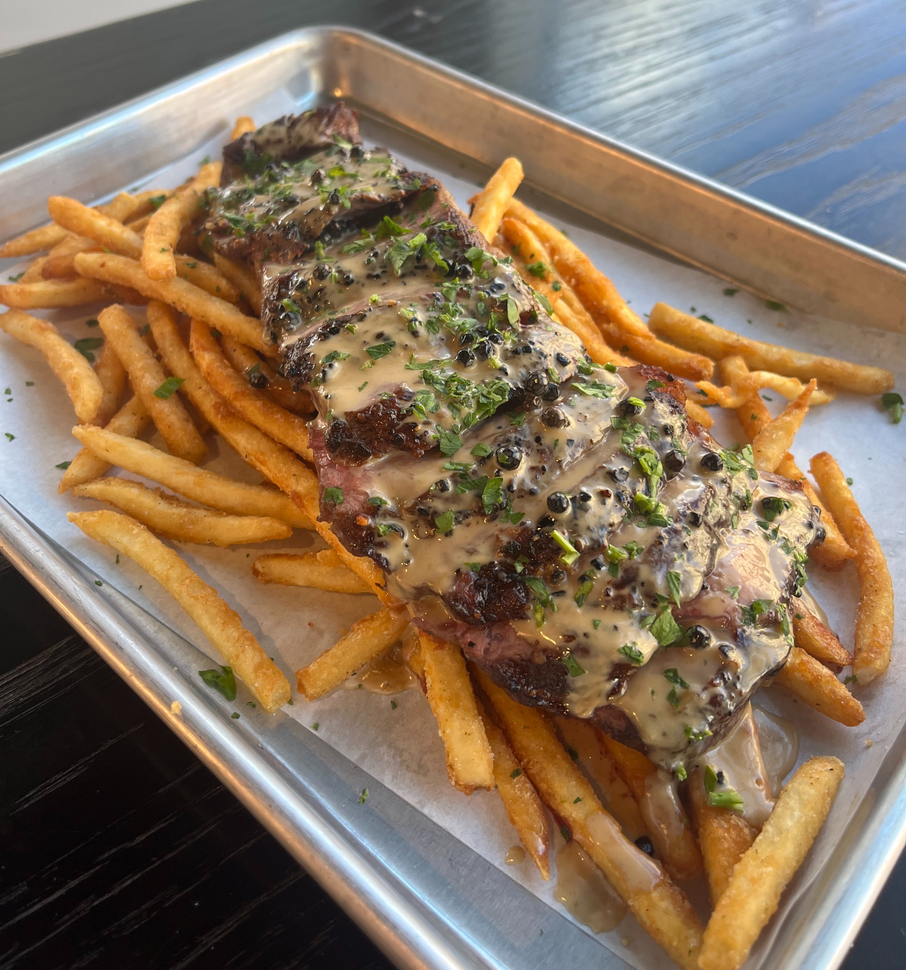 a chicken sandwich and fries on a plate