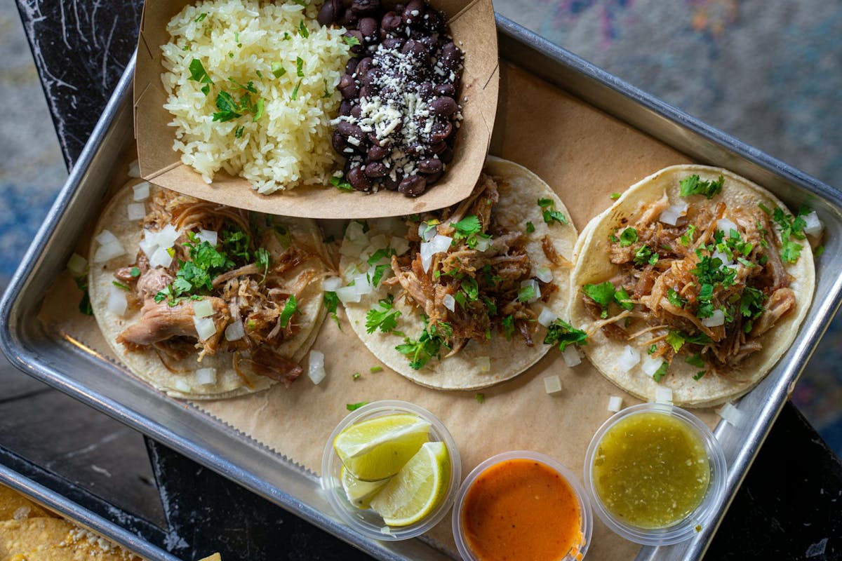 a box filled with different types of food on a tray