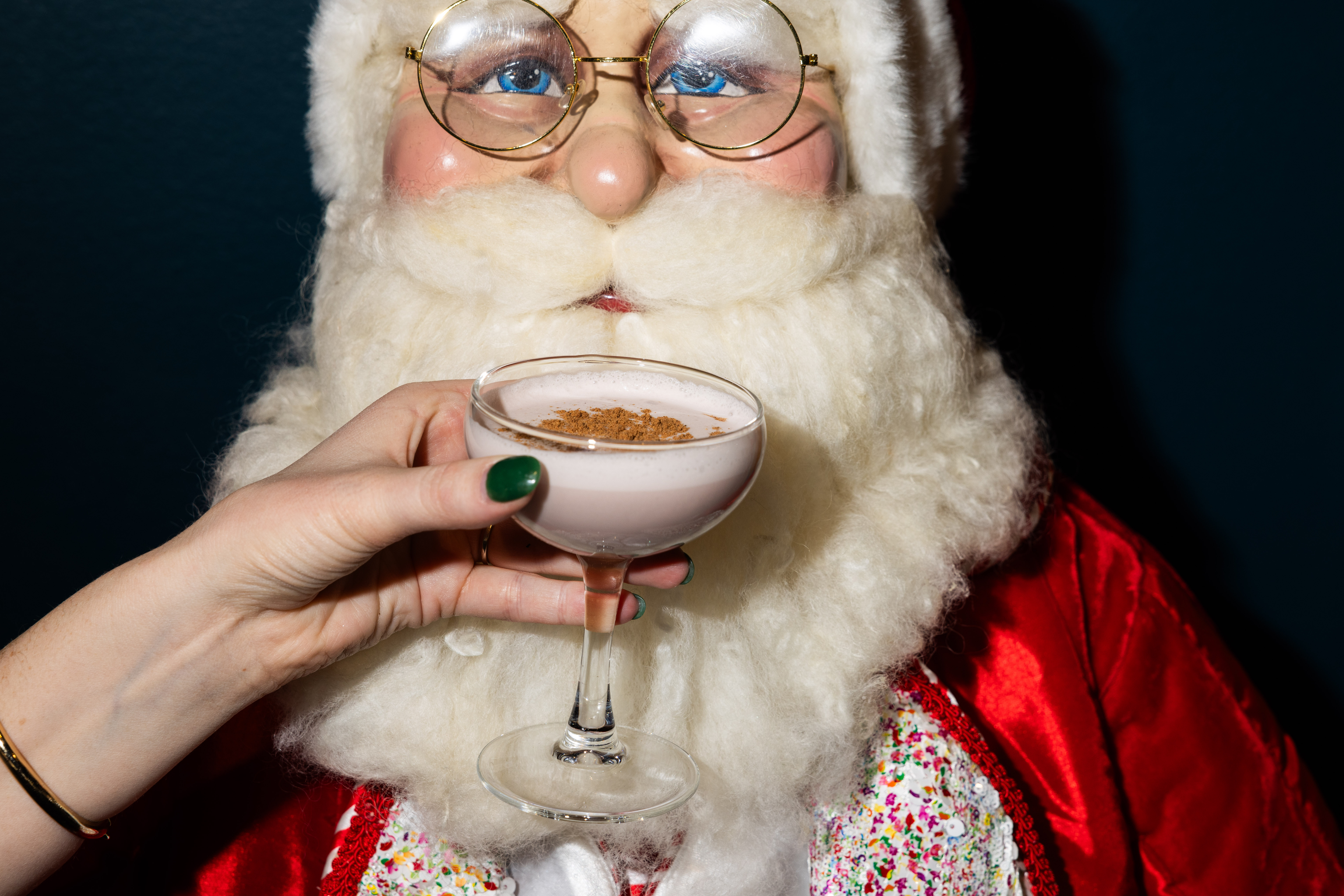 a person wearing a hat and glasses