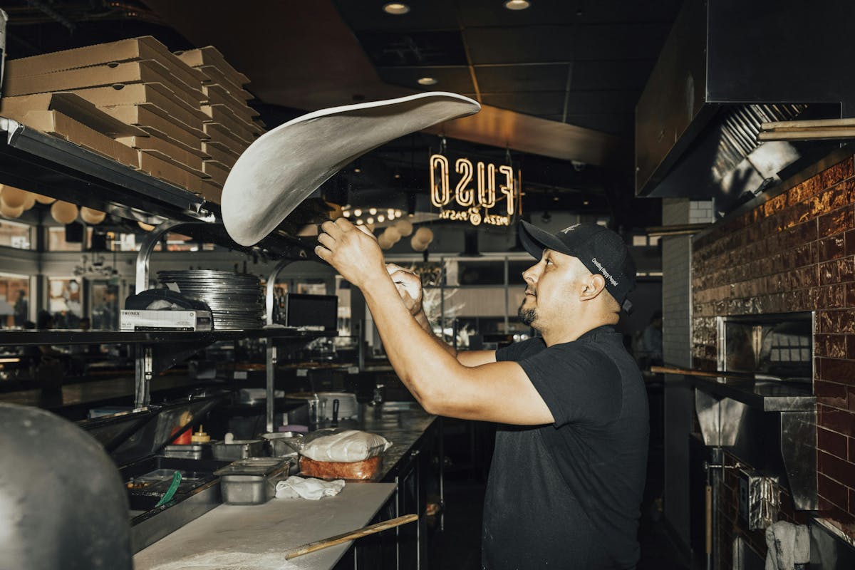 a man cooking in a kitchen