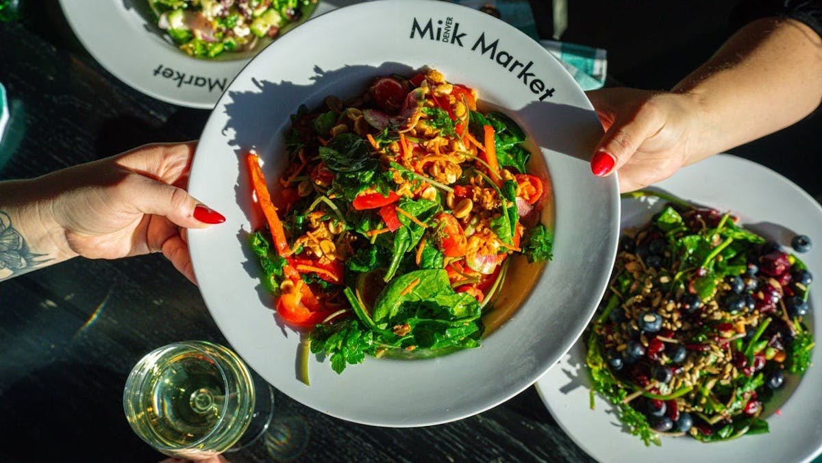 a bowl of salad on a plate