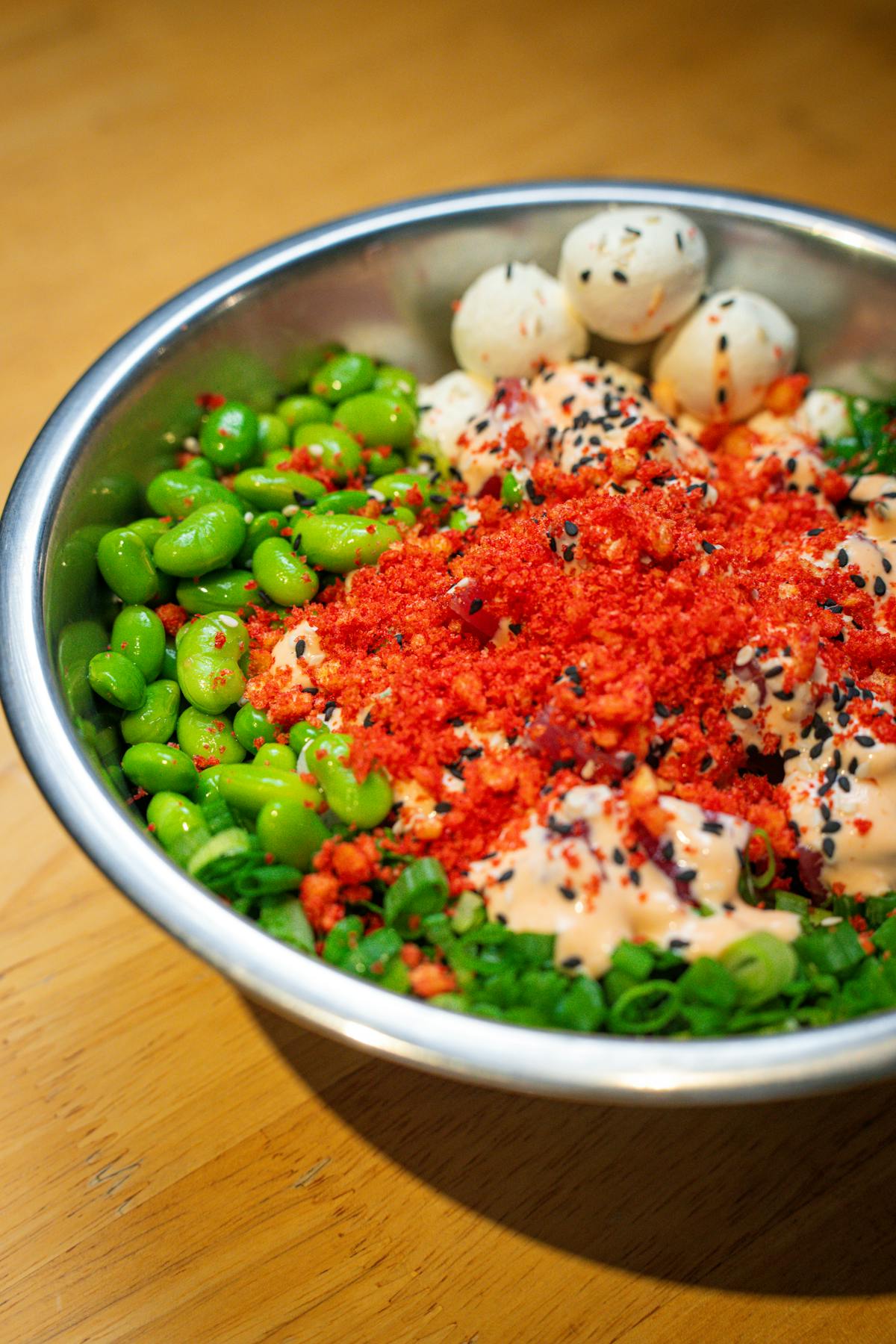 a bowl of food with broccoli