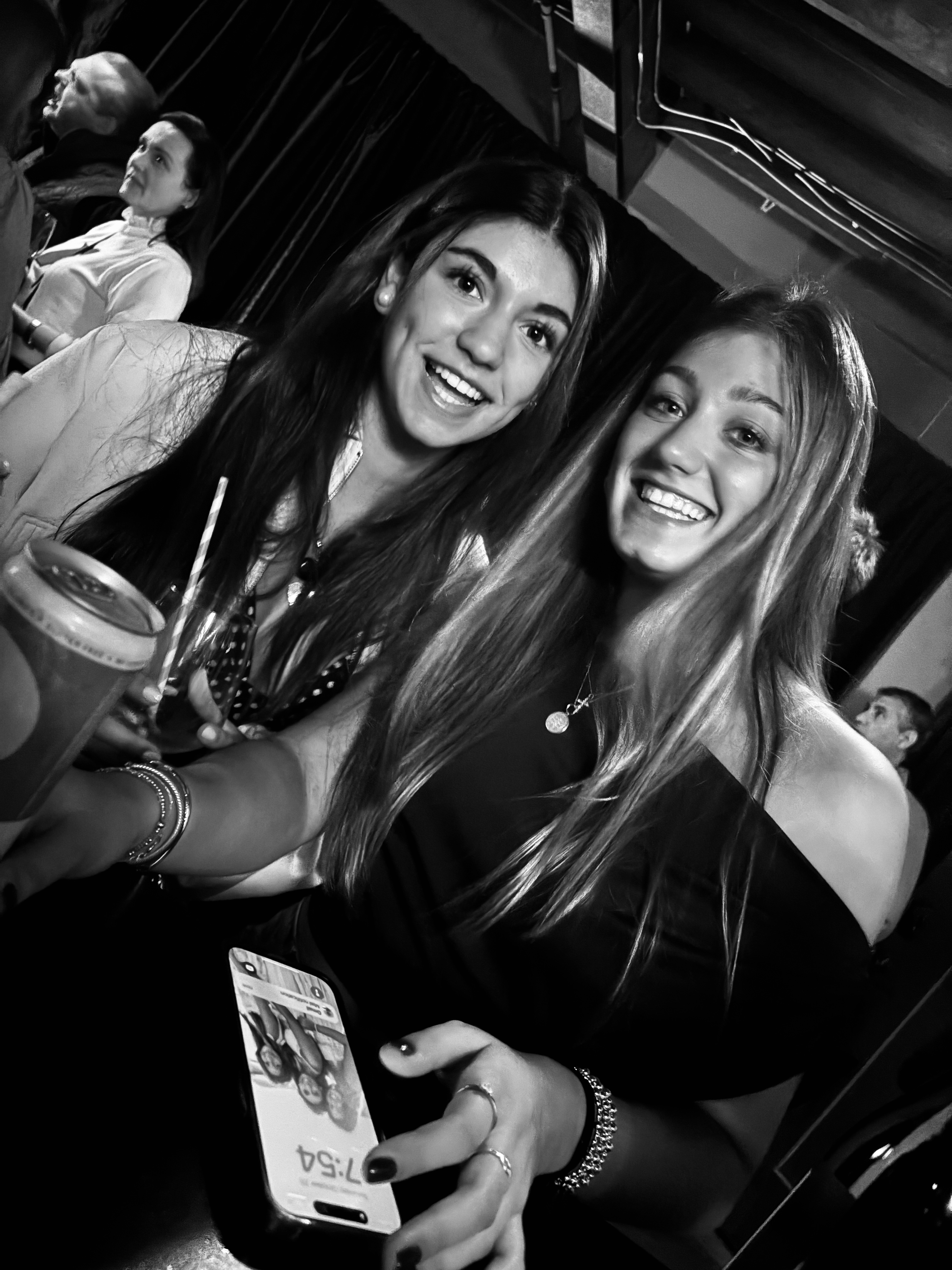 two women smiling at the camera