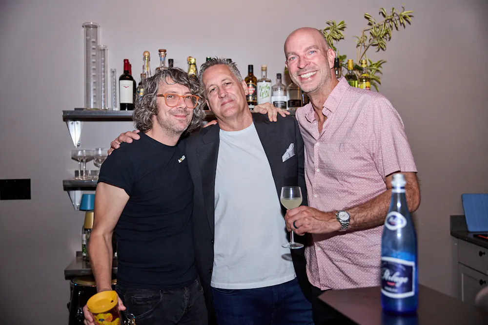 a group of men posing for a picture