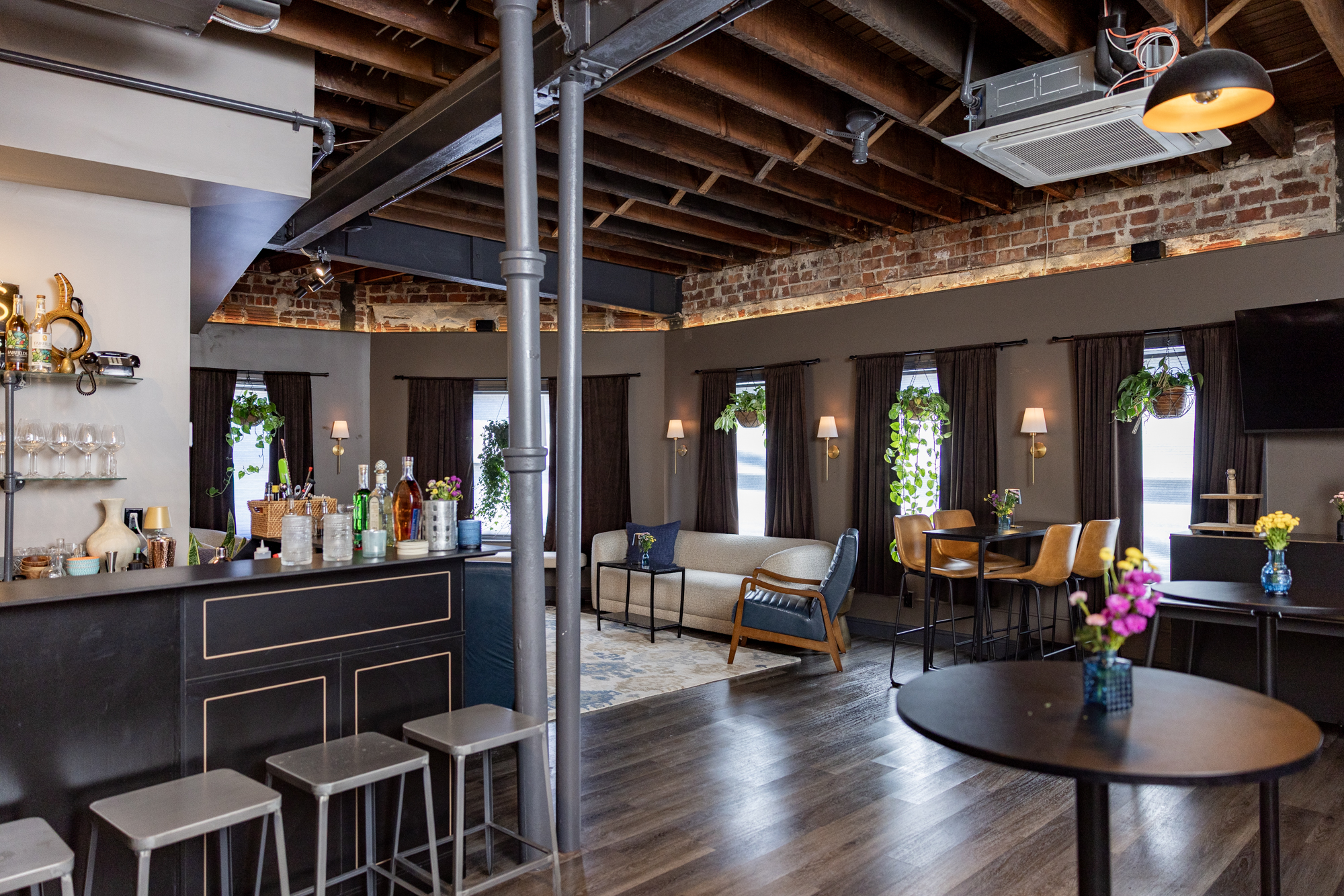 a room with a bar and a couch