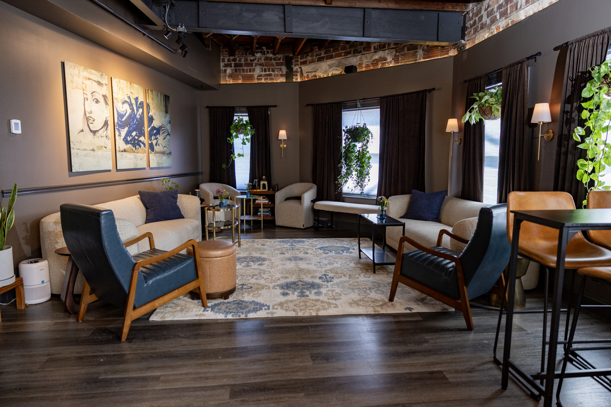 a room with couches and chairs