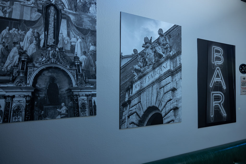 a group of pictures on a wall
