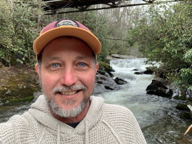 a man wearing a hat