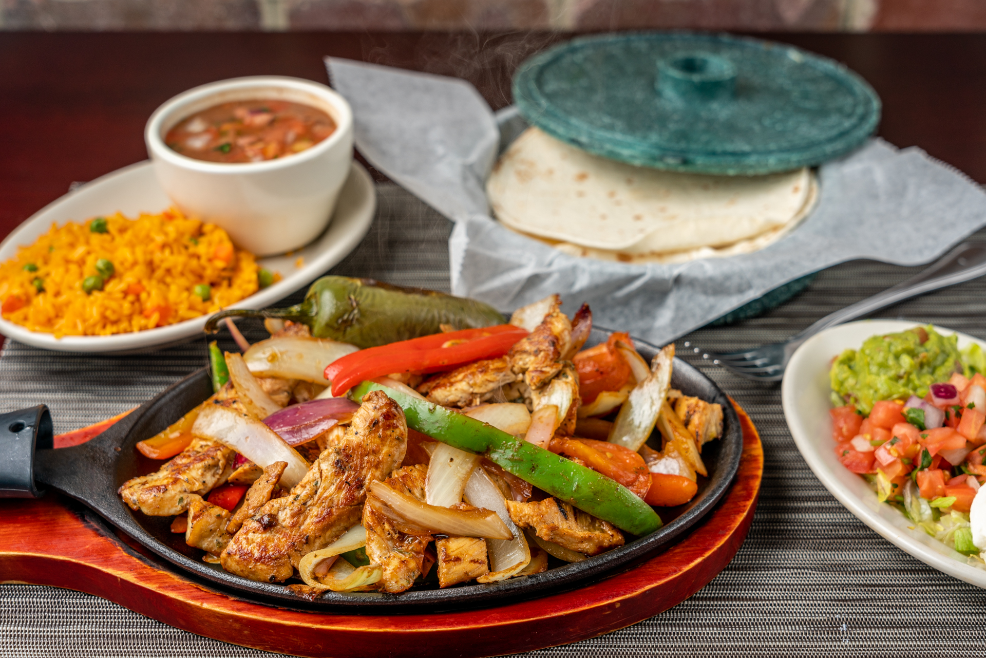 Sizzling chicken fajitas! Made with the freshest ingredients! 