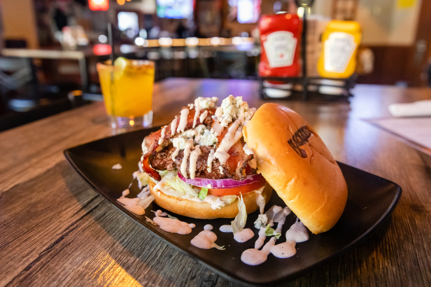 a plate of food sitting on top of a wooden table