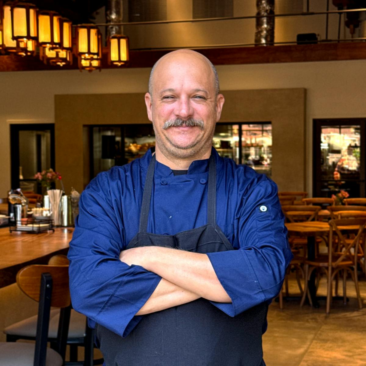 a smiling Chef Adam Cherney