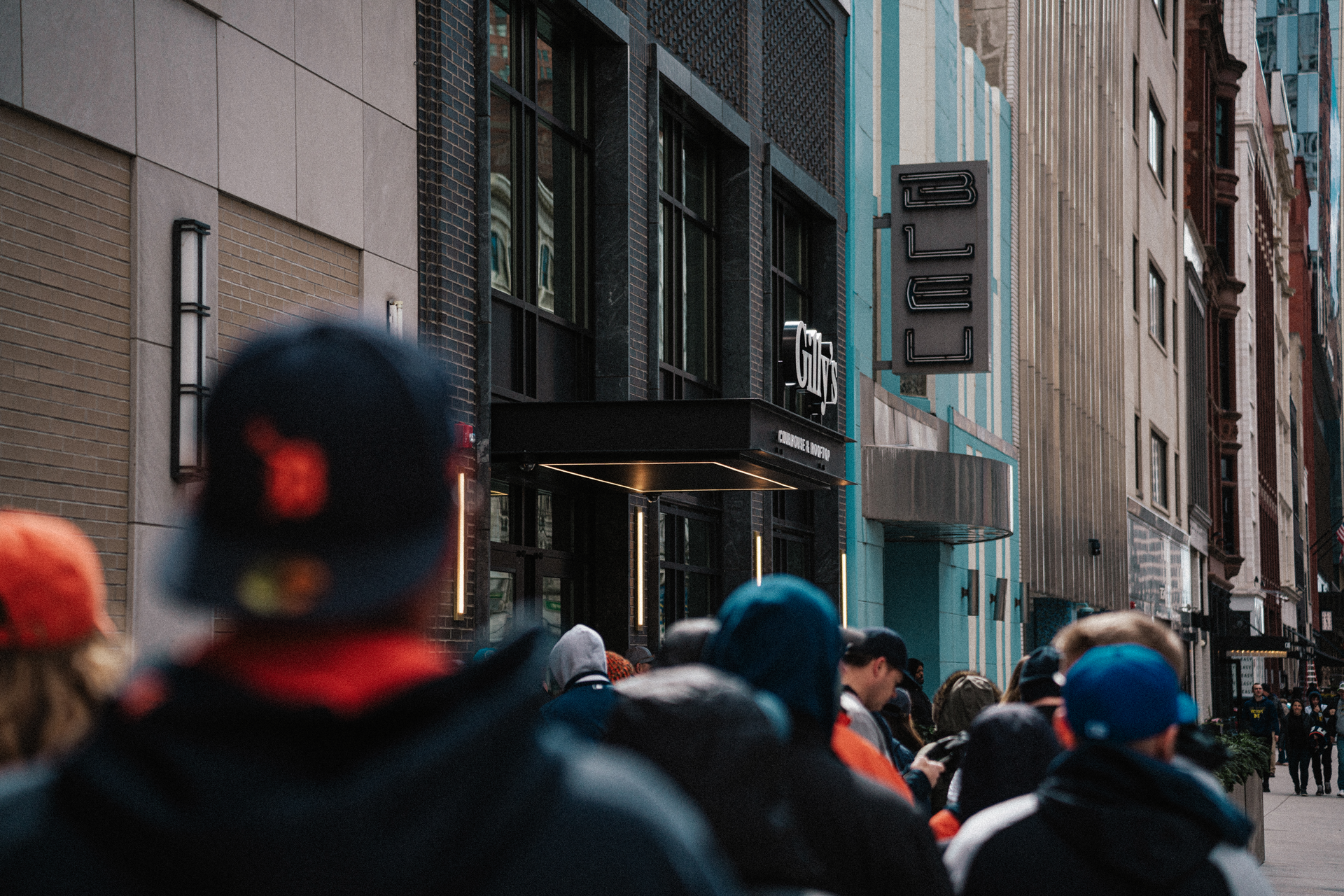 a group of people on a city street