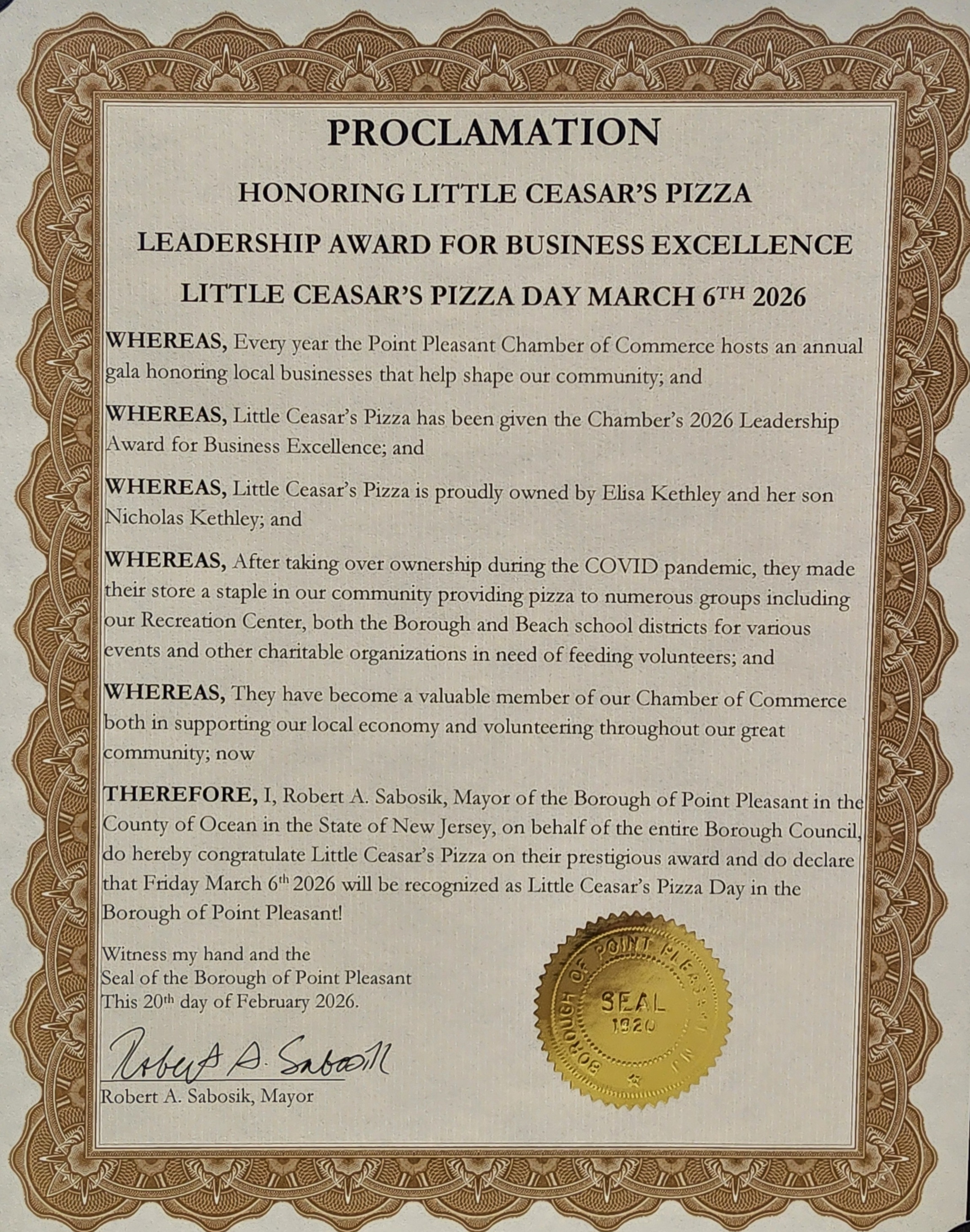 a certificate with a gold seal