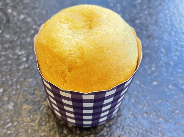 a close up of a glass of orange juice