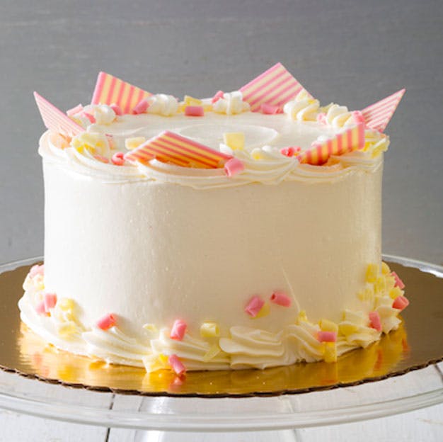 a close up of a piece of cake sitting on top of a table