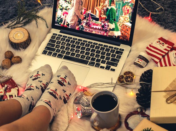 a group of stuffed animals sitting next to a cup of coffee