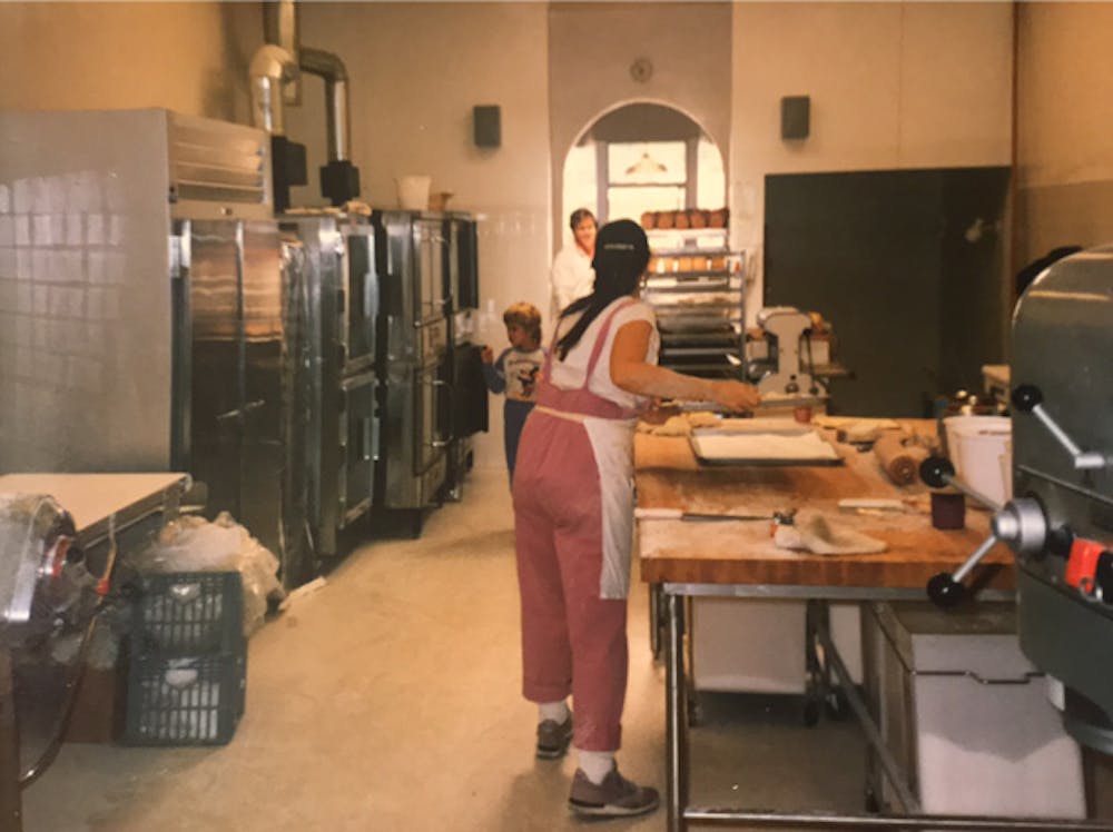 a man standing in a kitchen