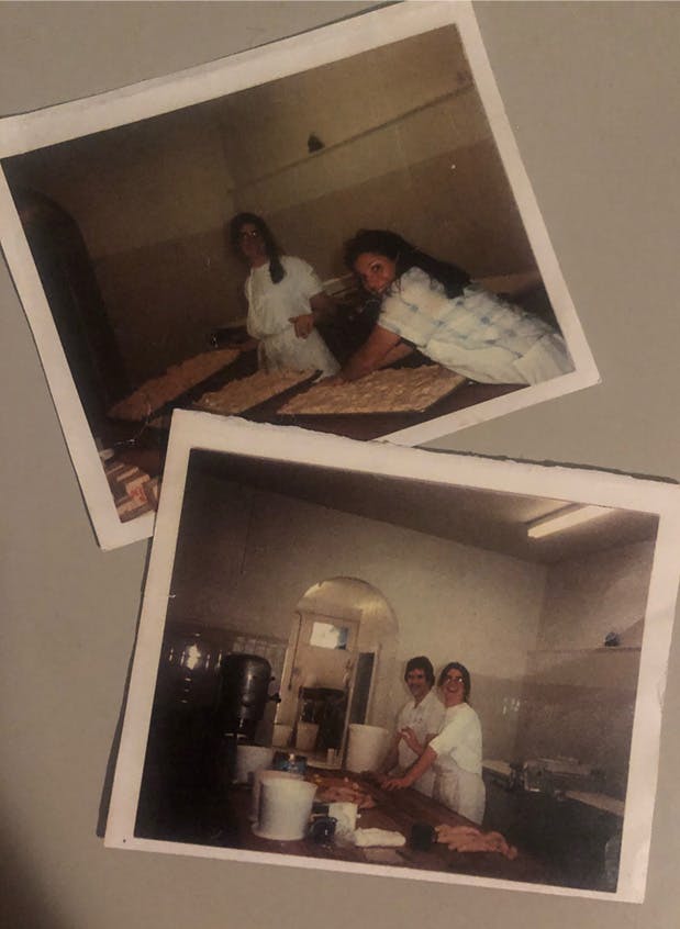 a man standing in front of a mirror