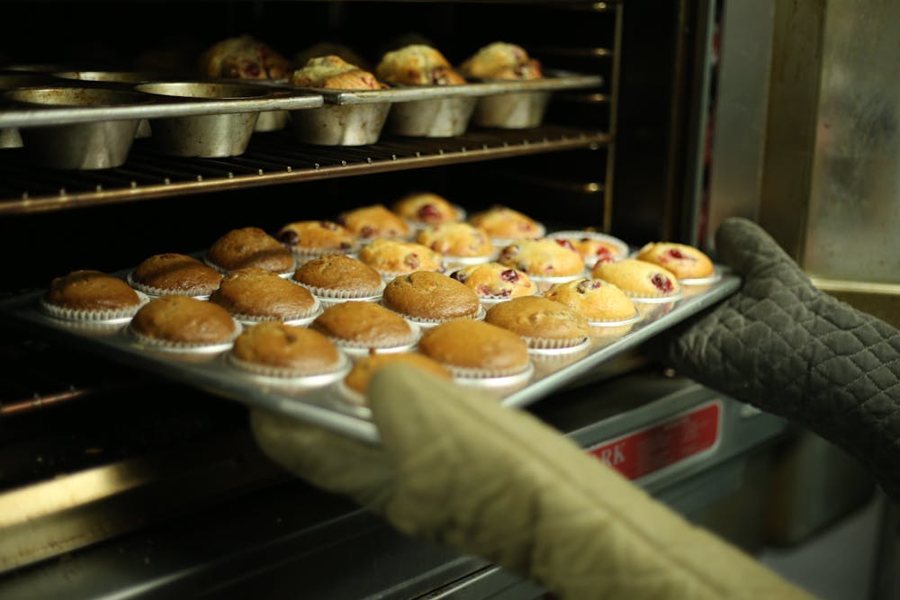 a doughnut is next to a glass display case