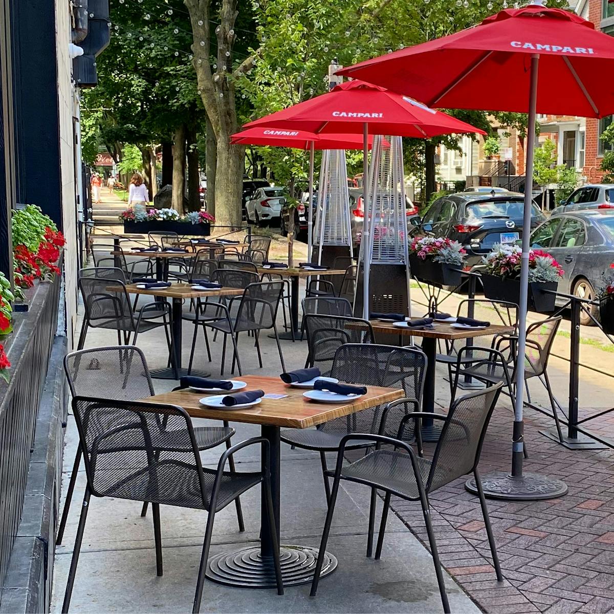 a group of lawn chairs sitting on top of a table