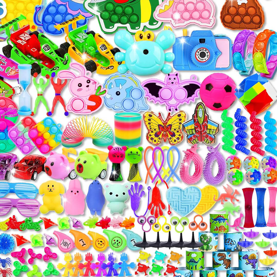 A wide collection of colorful children's party favors and fidget toys, featuring pop-its, slinkies, wind-up toys, and sticky hands.