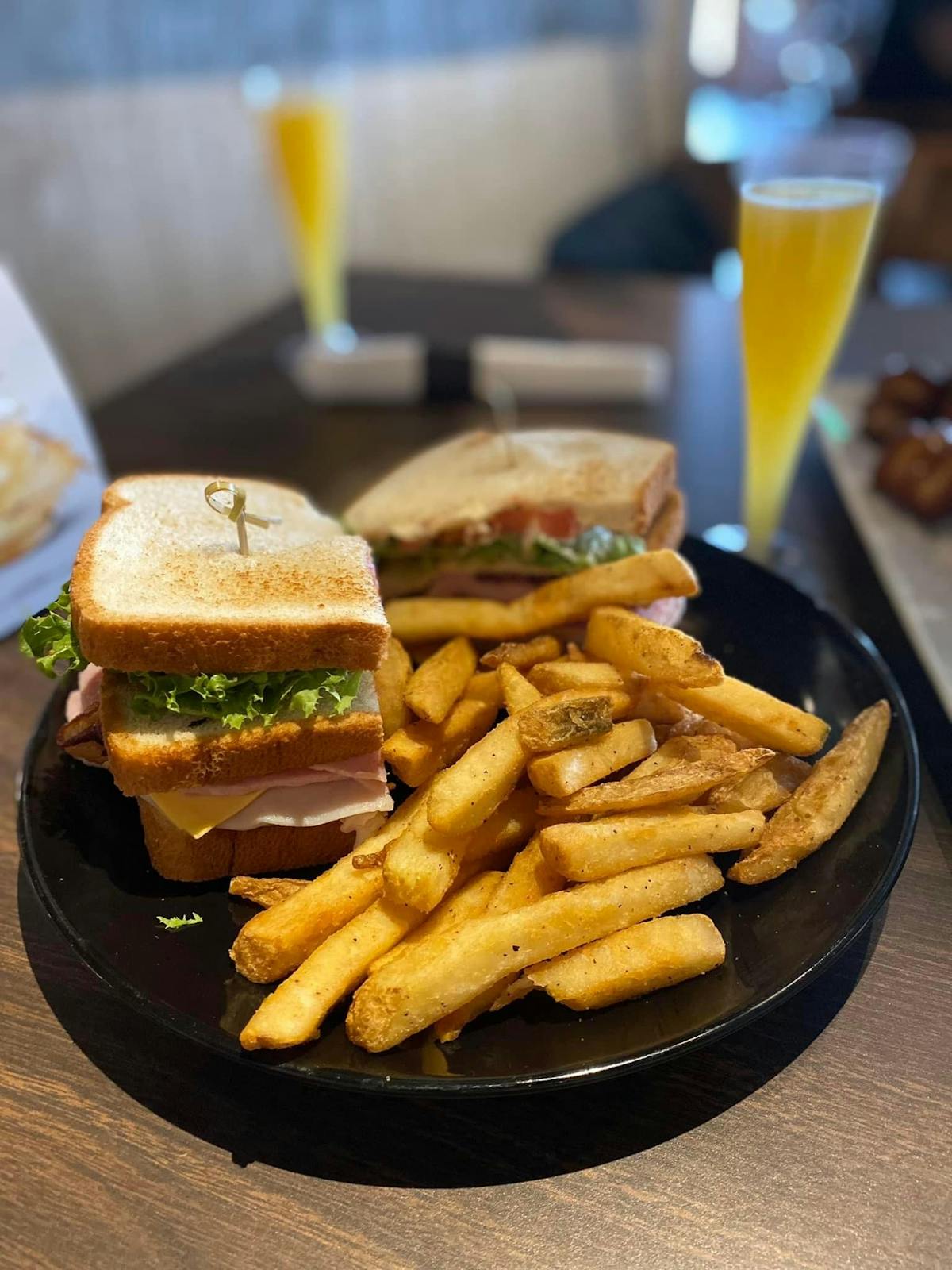 a sandwich and fries on a plate
