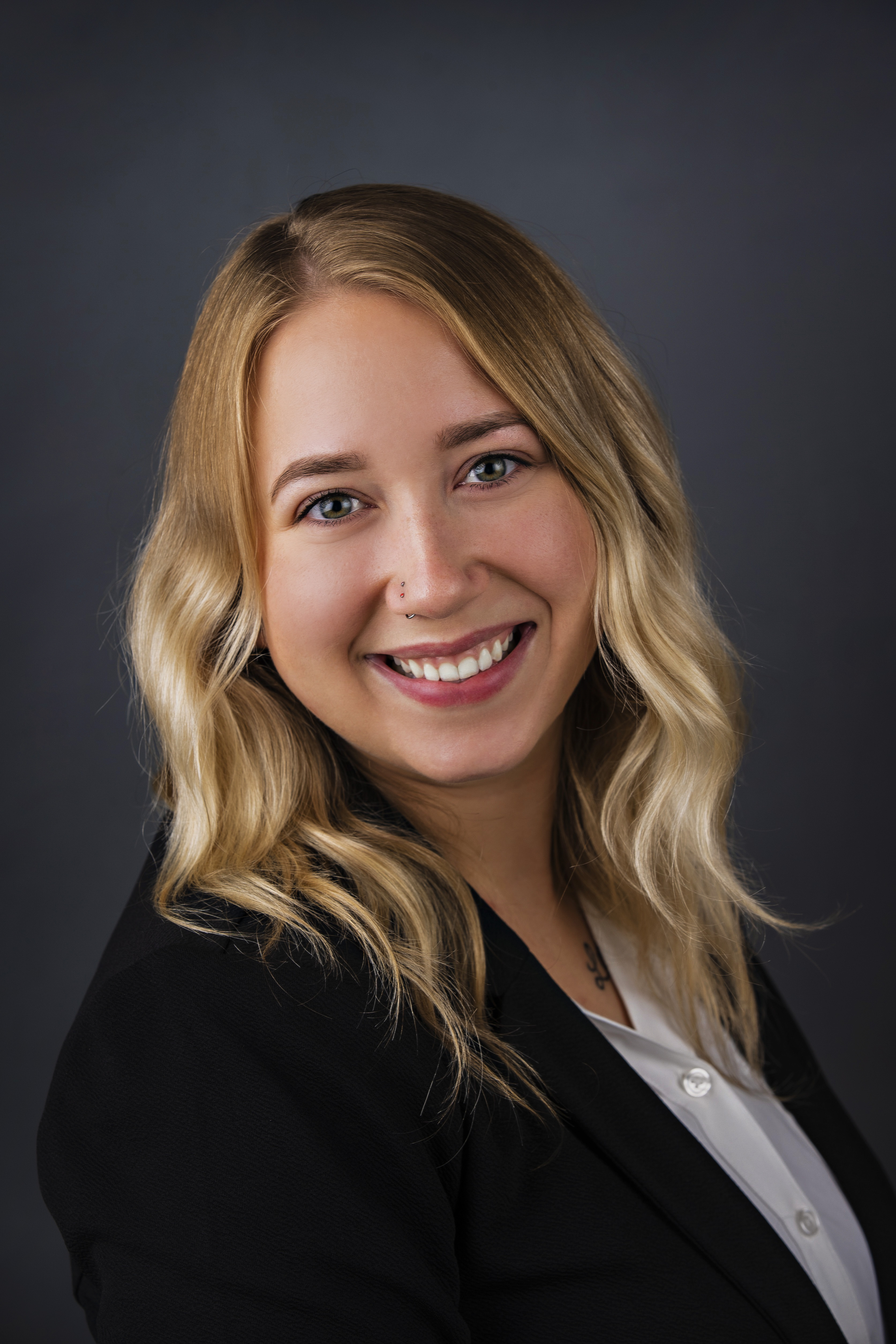 a woman smiling for the camera