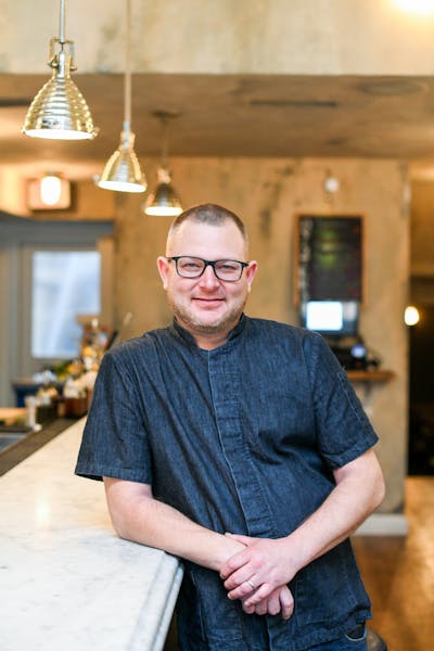 Chris Edwards standing in a room
