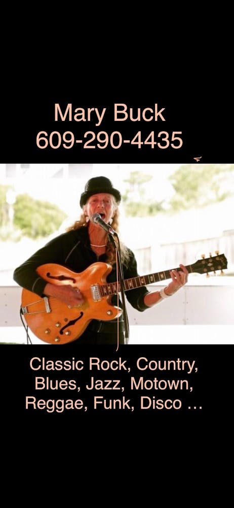 a man holding a guitar