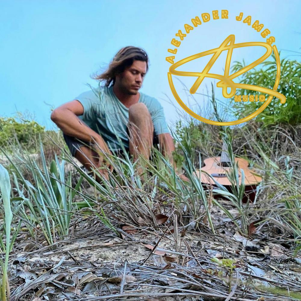 a man sitting on the grass