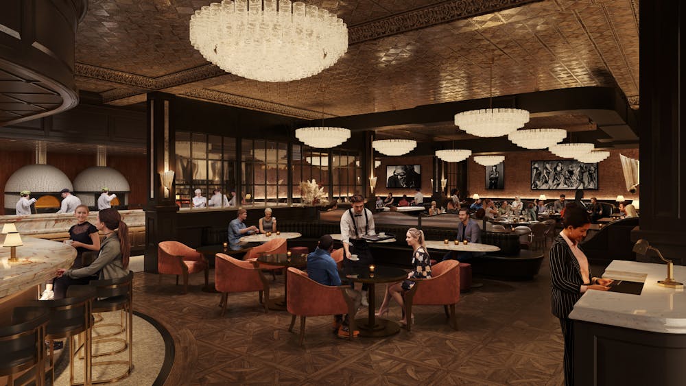 a group of people sitting at a dining room table